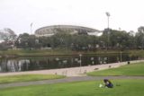 Adelaide_17_086_11102017 - Looking towards the Adelaide Oval with a homeless person loitering in the lawn near the River Torrens in the Adelaide CBD