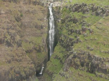 Waialae Falls (or Wai'alae Falls) is a another tall waterfall nestled deep in Waimea Canyon.  But if you intend to view this waterfall from the ground, you'll only get a...