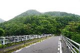 Akiu_Otaki_073_07202023 - Josh, Soph, and Mom further along the bridge containing the Akiu Otaki Waterfall