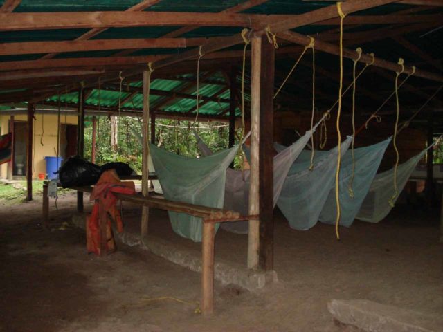 Hammocks covered in mosquito nets underneath a tin roof shelter at the Campamento Bernal after finally coming back from the Angel Falls lookout