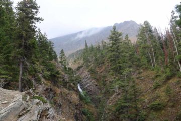 Appistoki Falls would forever be associated with huckleberries as far as we were concerned because ever since some locals showed us which plants were naturally growing the berries, Julie and Tahia...