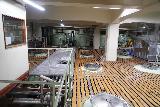 Asahikawa_072_07152023 - Looking at some processing vats and pipes used to manufacture sake as seen from within the Otokoyama Sake Museum in Asahikawa