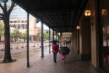 Austin_054_03112016 - Some shelter beneath the sporadic rain while walking to State Capitol Building