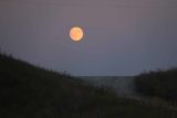 Babb_004_08062017 - Zoomed in on the bright rising moon as seen from the Thronson's Motor Lodge at Babb