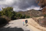 Bailey_Canyon_Falls_011_01212017 - Julie and Tahia on the familiar paved street leading towards the Sierra Madre dam and the trail leading to the Bailey Canyon Falls