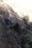 Bailey_Canyon_Falls_068_01212017 - Tahia and Julie getting around the hard part of the landslide obstacle in Bailey Canyon
