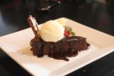 Bambara_004_05282017 - The flourless chocolate cake with vanilla bean ice cream dessert from Bambara in downtown Salt Lake City