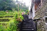 Bantu_Lantang_041_06192022 - Going up some steps alongside the main warung towards the trail that would eventually take us down to the Batu Lantang Waterfall