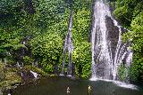 Banyumala_Twin_062_06202022 - Context of some people cooling off at the base of the Banyumala Twin Waterfalls
