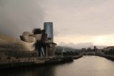 Bilbao_168_06132015 - Another menacing look towards the Guggenheim Bilbao museum with dark clouds hovering above