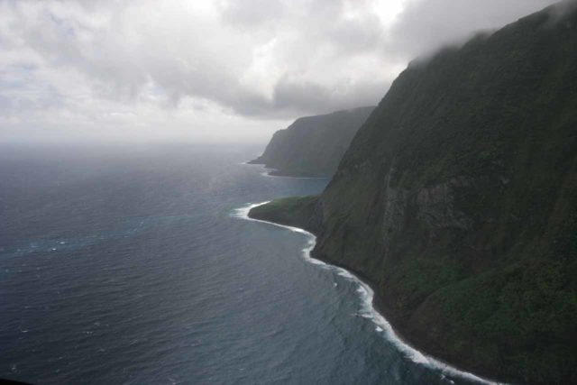 Blue_Hawaiian_Maui_Heli_164_02252007 - Looking back towards the mouth of Papalaua Valley while flying besides the steep sea cliffs of Moloka'i's North Shore