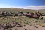 Bodie_024_08032015 - Looking down towards the vast majority of buildings belonging to the ghost town of Bodie seen from atop a small hill