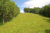 Bredekfossen_177_07092019 - Looking up at the grassy hill that I descended beneath the Bredek Farm