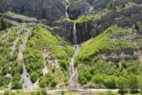 Bridal_Veil_Falls_Provo_042_05282017 - Broad look from the scenic view area towards Bridal Veil Falls with people at its base providing a sense of scale