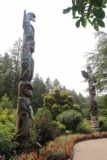 Butchart_Gardens_088_08022017 - Checking out the totem poles near the merry-go-round in the Butchart Gardens