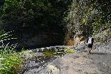 Canon_de_San_Cristobal_067_04202022 - Ricardo approaching the top of La Cabra Waterfall