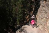 Canyon_North_Rim_098_08102017 - Julie and Tahia continuing to descend the trail to the Red Rock Lookout as they started to enter the shaded section during our August 2017 visit