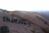 Canyonlands_17_029_04212017 - Contextual look at the crowd of people waiting to snap sunrise photos through Mesa Arch