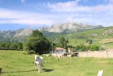Cascada_La_Gandara_008_06142015 - Looking over some pastures towards attractive mountains seen on the way to the Mirador de Cascada La Gandara