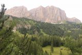 Cascate_di_Pisciadu_182_07162018 - Looking across the valley from the base of Cascate del Pisciadu towards the Dolomite Peaks with a house below for a sense of scale