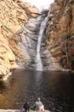 Cedar_Creek_Falls_126_01072017 - A couple enjoying Cedar Creek Falls from across the wide plunge pool