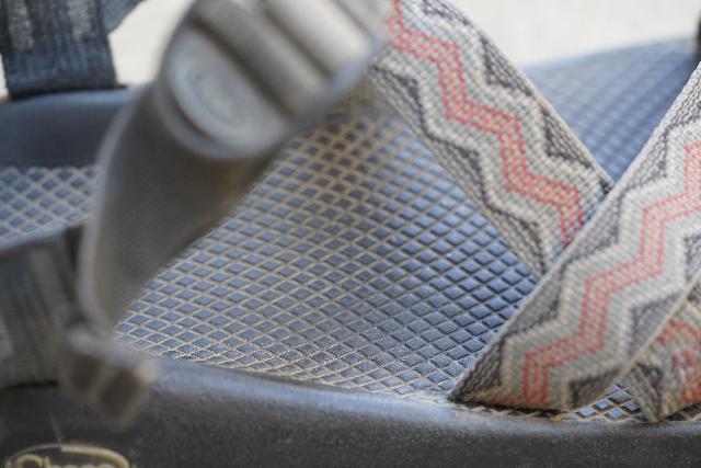 Closeup look at the front of the strap where you can pull on them to further adjust and customize the fit of the Chaco Z/1 Classic Sandal