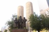Chicago_278_10072015 - Some statues fronting cylindrical high rises with large car parks along the Chicago River Walk