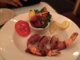 Cirino_001_mom_05202016 - The appetizer dish of some kind of prosciutto wrapped around grilled shrimp