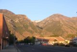 Communal_001_05252017 - Looking back towards some mountains and a canyon bathed in late afternoon light in downtown Provo