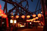 Copenhagen_208_07272019 - Twilight look at the Demon Ride above the Chinese lanterns lighting up Tivoli Gardens in Copenhagen