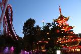 Copenhagen_215_07272019 - Pagoda and Demon being lit up against the twilight night at Tivoli Gardens in Copenhagen