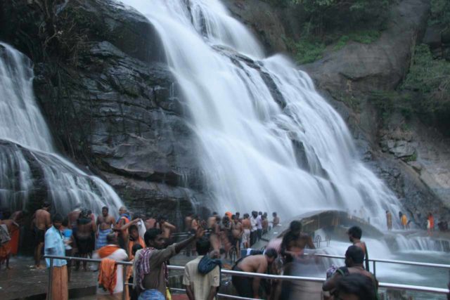 Courtallam_Falls_035_11192009 - Many people taking turns getting drenched beneath the Courtallam Main Falls and its Ayurvedic properties