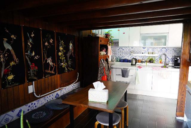 Communal accommodations are characterized by shared spaces like this shared kitchen and dining room