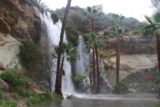 Dana_Point_Waterfall_012_01222017 - Looking across the plunge pool towards the Dana Point Waterfall. The red you see on the lower right was someone holding an umbrella, which gives you a sense of scale of the size of this falls