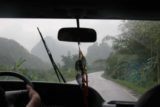 Daxin_001_04222009 - Driving into mountainous bush scenery under the rain