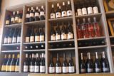 Daylesford_006_11192017 - Lots of wines on the wall behind the table we sat at in Larder in Daylesford