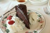Death_Valley_17_424_04082017 - The indulgent triple layer chocolate cake with cream and vanilla bean ice cream at Furnace Creek Inn