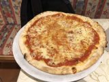 Dolomites_108_jx_07172018 - This was Tahia's margherita pizza which was really more like cheese pizza served up at the pizzeria nearby our accommodation at Residence Antares in Selva di Val Gardena in the Dolomites of Northern Italy