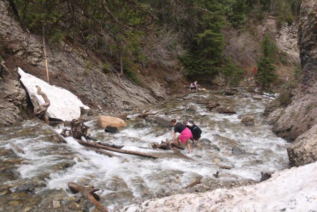 Donut_Falls_123_05262017 - Looking back at someone wading back across the Mill D South Fork Creek after having had their fill of their closeup of Donut Falls