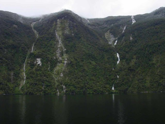 Doubtful_Sound_026_11252004 - Browne Falls (right) with a thin companion waterfall (left) as seen from a Doubtful Sound Cruise