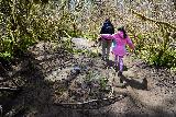 Drift_Creek_Falls_037_04082021 - Julie and Tahia getting through a muddy spot on the Drift Creek Falls Trail