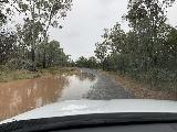Drive_from_Rainbow_Falls_011_iPhone_07042022 - Going around a pretty large flood puddle on the return drive back from Gudda Gumoo (Rainbow Falls) in Blackdown Tablelands National Park