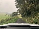 Drive_to_Millaa_Millaa_006_iPhone_06292022 - Continuing on the narrow rural road through some misty weather on the way to Millaa Millaa