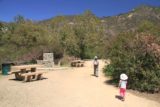 Eaton_Canyon_Falls_14_024_04062014 - Julie and Tahia hiking past some picnic tables nearby the Eaton Canyon Falls Trailhead during our April 2014 visit
