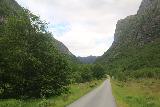 Eidfjord_kommune_004_06232019 - The adventure into Hjølmodalen's narrow mountain road began past the sign you see up ahead in this photo on this single-lane road at Øvre Eidfjord