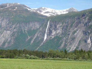 Strandfossen was a tall waterfall that we noticed during our excursion into Eikesdalen Valley to see Mardalsfossen.  It was a conspicuous presence as it was facing the Eresfjord at the mouth...
