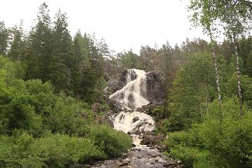 Elgafossen (or more accurately Elgåfossen in Norwegian and Älgafallet in Swedish) was a shared waterfall between Norway and Sweden. In fact, its watercourse on a tributary of the Enningdalsälven...