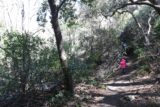 Falls_Canyon_Falls_029_02212016 - Julie and Tahia continuing along the trail-of-use within Falls Canyon while also trying to dodge poison oak