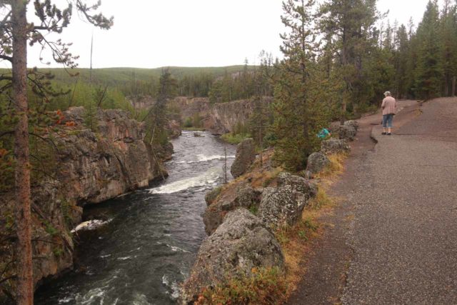 Firehole_Canyon_Drive_090_08142017 - Looking downstream over some of the lower drops of the Cascades of the Firehole from a wide paved path alongside the Firehole River