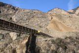 Fish_Canyon_Falls_018_02132016 - Looking back at the quarry bridge hauling rocks across the site